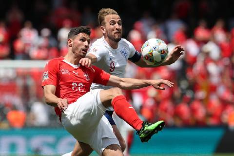 June 9, 2019 - Guimaraes, Portugal - Switzerland s defender Fabian Schar (L ) vies with Harry Kane of England (R ) during the UEFA Nations League Third-place football match between Switzerland and England, at the Dom Afonso Henriques stadium in Guimaraes, Portugal, on June 9, 2019. Switzerland vs England - UEFA Nations League Third-place match - ZUMAn230 20190609_zaa_n230_071 Copyright: xPedroxFiuzax