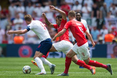 Guimaraes, Portugal, 09 06 2019, UEFA Nations League, 3 Place, Switzerland England, Harry Kane England , Kevin Mbabu Switzerland and Nico Elvedi Switzerland battle for the ball Defodi 09 531 002561 Defodi-531