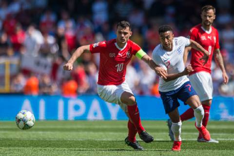 Guimaraes, Portugal, 09 06 2019, UEFA Nations League, 3 Place, Switzerland England, Granite Xhaka Switzerland and Jesse Lingard England battle for the ball Defodi 09 531 002625 Defodi-531