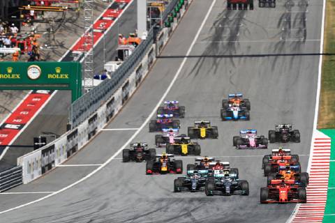 30th June 2019, Red Bull Ring, Spielberg, Austria; FIA Formula 1 Grand Prix, Race Day; Scuderia Ferrari, Charles Leclerc leads race start with Mercedes AMG Petronas Motorsport, Lewis Hamilton making a move on the inside of the circuit  ActionPlus12149382 Octane