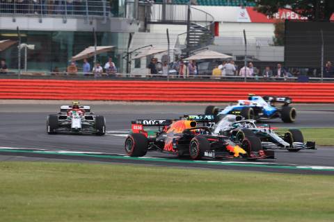 12th June 2019, Silverstone, Northampton, England; F1 Grand Prix of Great Britain, Practice sessions; Mercedes AMG Petronas Motorsport, Valtteri Bottas and Aston Martin Red Bull Racing, Pierre Gasly  ActionPlus12153109 Octane