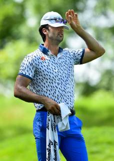 July 13, 2019 - Silvis, Iowa, USA - PGA, Golf Herren golfer Cameron Triangle adjusts his cap during the third round of the John Deere Classic Saturday, July 13, 2019, at TPC Deere Run in Silvis. Golf 2019: John Deere Classic Iowa - ZUMAq30_ 20190713_zaf_q30_081 Copyright: xMegxMclaughlin Mmclaughlin@Qconlx