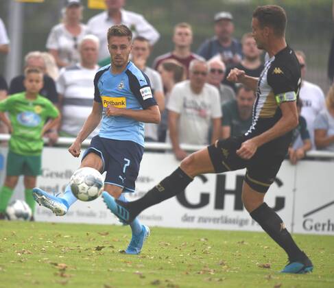 Test match Borussia Mönchengladbach SCO Angers France 27 07 2019 left Patrick Herrmann BMG shoots ahead Romain Thomas DFL REGULATIONS PROHIBIT ANY USE OF PHOTOGRAPHS AS IMAGE SEQUENCES AND OR QUASI VIDEO HM
