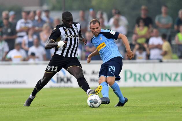 Football 1 Bundesliga Season 2019 2020 Test match SCO Angers vs Borussia Mönchengladbach , 27 07 2019, Roman Stadium Straelen,Wilfride Kanga SCO Angers Tony Jantschke, Borussia Mönchengladbach, DFL regulations prohibit any use of photographs as image sequences and or quasi video