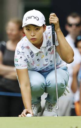 Golf: Women s British Open Hinako Shibuno of Japan lines up a putt on the first hole during the final round of the Women s British Open en route to winning the title on Aug. 4, 2019, at Woburn Golf Club in Milton Keynes, England. 