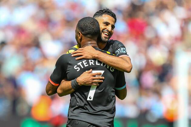 Raheem Sterling of Manchester City celebrates after he scores with Riyad Mahrez of Manchester City during the Premier League match between West Ham United and Manchester City at the London Stadium, London, England on 10 August 2019. Copyright: xDavidxHornx PMI-2960-0088