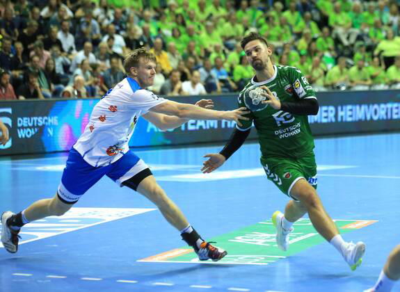 GER, DHB, 1 HBL, FUECHSE BERLIN VS TVB Stuttgart 15 09 2019, Max Schmeling Halle, Berlin, GER, DHB, 1 HBL, FUECHSE BERLIN VS TVB Stuttgart, DHB regulations prohibit any use of photographs as image sequences and or quasi video in picture Fabian Wiede Fuechse Berlin 3 , Adam Loenn Stuttgart 11 nordphotox xEngler nph00076