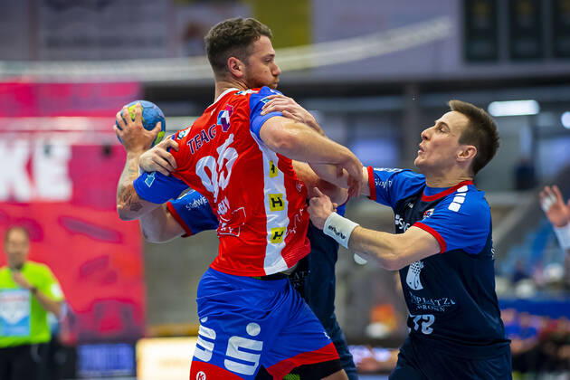 Bietigheim, Germany 25 August 2019 2 BL 19 20 SG BBM Bietigheim vs ThSV Eisenach v left in duel Alexander Saul Eisenach and Martin Marcec SG BBM Bietigheim Bietigheim Egetrans Arena Baden Württemberg Germany