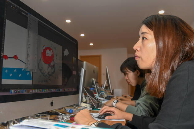(190926) -- CHANGCHUN, Sept. 26, 2019 -- Designers work at Jilin University of Arts in Changchun, northeast China s Jilin Province on Sept. 26, 2019. Shuey Rhon Rhon, the mascot of the 2022 Paralympic Winter games, Winterspiele,Spiele, Summer games is a Chinese lantern child ready to welcome friends from around the world for a big party. Exuding positivity, the glow emanating from its heart symbolises the inspiring warmth, friendship, courage and perseverance of Para athletes that light up the dreams of millions every day. ) (SP)JILIN-CHANGCHUN-2022 PARALYMPIC WINTER GAMES-MASCOT ZhangxNan