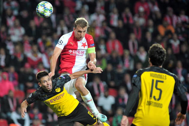 October 2, 2019, Prague, Czech Republic: Tomas Soucek captain of Slavia Prague (up) in heads duel with Raphael Guerreiro of Borussia Dortmund (down) during the UEFA Champions League group F soccer match between Slavia Prague and Borussia Dortmund in Prague, Czech Repulic, 02 October 2019. On photo right is Mats Akanji of Borussia Dortmund. Soccer: Slavia Prague v Borussia Dortmund, UEFA Champions League, Group F - ZUMAr156 20191002_zap_r156_017 Copyright: xSlavekxRutax