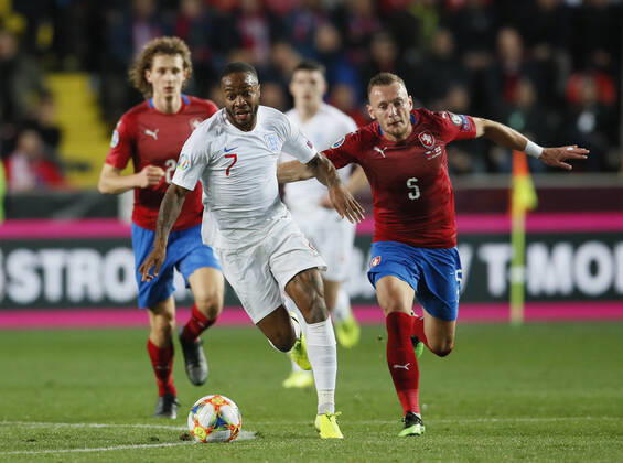 Raheem Sterling of England runs clear of Vladimir Coufal of Czech Republic during the UEFA EURO, EM, Europameisterschaft,Fussball 2020 Qualifying match at the Sinobo Stadium, Prague. Picture date: 11th October 2019. Picture credit should read: David Klein Sportimage EDITORIAL USE ONLY. No use with unauthorised audio, video, data, fixture lists, club league logos or live services. Online in-match use limited to 120 images, no video emulation. No use in betting, games or single club league player publications. SPI-0252-0072