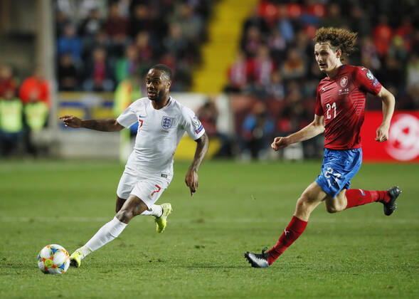 Raheem Sterling of England runs clear of Alex Kral of Czech Republic during the UEFA EURO, EM, Europameisterschaft,Fussball 2020 Qualifying match at the Sinobo Stadium, Prague. Picture date: 11th October 2019. Picture credit should read: David Klein Sportimage EDITORIAL USE ONLY. No use with unauthorised audio, video, data, fixture lists, club league logos or live services. Online in-match use limited to 120 images, no video emulation. No use in betting, games or single club league player publications. SPI-0252-0075