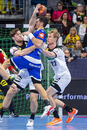 Mannheim, Germany 04 January 2020 International Handball European Championship 2020 Germany vs. Iceland vs. left in duel Johannes Golla Germany SG Flensburg , Alexander Petersson Iceland , Marian Michalczik Germany GWD Minden Mannheim SAP Arena Baden Württemberg Germany