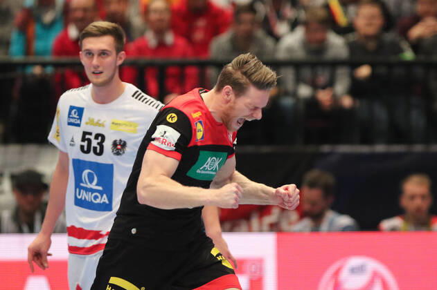 Austria Germany, EHF Euro 2020 Tobias Reichmann Germany 9 , cheers, Nikola Bilyk Austria 53 , is annoyed , Vienna Vienna Austria Ice rink