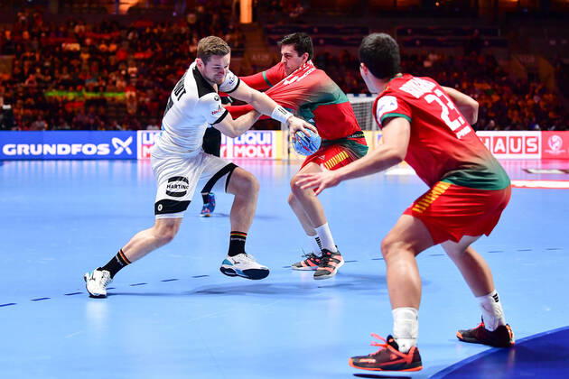 European Handball Championship Match for Rank 5, 25 01 2020, Germany Portugal, Tele2 Arena, Stockholm David Schmidt Germany, 77 Alexandre Cavalcanti Portugal, 24 Diogo Branquinho Portugal, 23 Attack Half Right Action, 25 01 2020, Stockholm Sweden Sweden, Handball, EM 2020, Match for Rank 5, Germany Portugal xshx