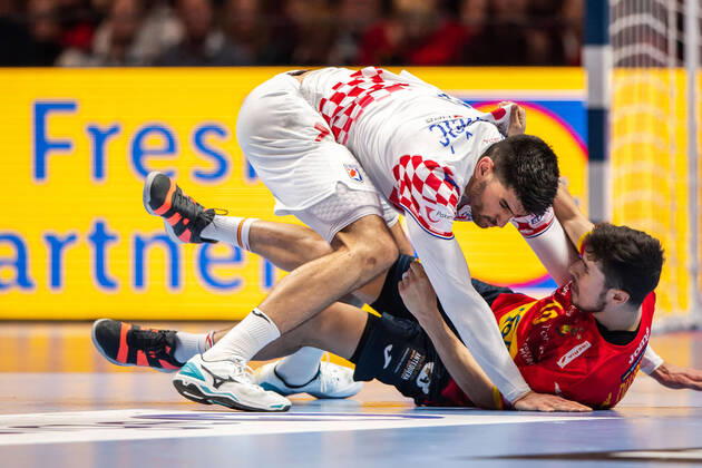 200126 Luka Stepanic of Croatia and Alex Dujshebaev Dovichebaeva of Spain during the EHF European Handball Championship final between Spain and Croatia on January 26, 2020 in Stockholm,  Copyright: JESPERxZERMAN BB200126JZ061
