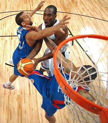 September 1, 2007, Las Vegas, NV, EU: Las Vegas, NV: Kobe Byant scores two points as Ricky Sanchez tries to block as Peter Ramos works under rim,n at the 2007 FIBA Americas Basketball championship games in Las Vegas, Nevada. The top two teams from this tournament of the Americas, will enter the Beijing Olympics next year. ( END)2007 Latino News - September 1, 2007  - ZUMAd69_ 20070901_zaa_d69_003 Copyright: xGaryxWilliamsx
