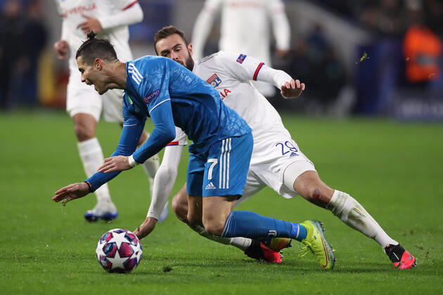 Juventus s Portuguese striker Cristiano Ronaldo is fouled by Lyon s French midfielder Lucas Tousart during the UEFA Champions League match at the Groupama Stadium, Lyon. Picture date: 26th February 2020. Picture credit should read: Jonathan Moscrop Sportimage EDITORIAL USE ONLY. No use with unauthorised audio, video, data, fixture lists, club league logos or live services. Online in-match use limited to 120 images, no video emulation. No use in betting, games or single club league player publications. SPI-0491-0010