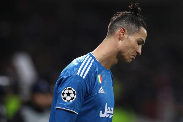Juventus s Portuguese striker Cristiano Ronaldo reacts during the UEFA Champions League match at the Groupama Stadium, Lyon. Picture date: 26th February 2020. Picture credit should read: Jonathan Moscrop Sportimage EDITORIAL USE ONLY. No use with unauthorised audio, video, data, fixture lists, club league logos or live services. Online in-match use limited to 120 images, no video emulation. No use in betting, games or single club league player publications. SPI-0491-0039
