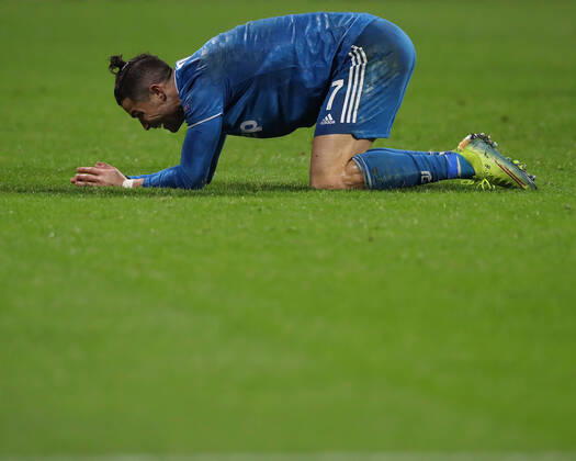 Juventus s Portuguese striker Cristiano Ronaldo reacts during the UEFA Champions League match at the Groupama Stadium, Lyon. Picture date: 26th February 2020. Picture credit should read: Jonathan Moscrop Sportimage EDITORIAL USE ONLY. No use with unauthorised audio, video, data, fixture lists, club league logos or live services. Online in-match use limited to 120 images, no video emulation. No use in betting, games or single club league player publications. SPI-0491-0054