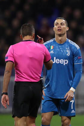 Juventus s Portuguese striker Cristiano Ronaldo reacts in front of Spanish referee Gil Manzano during the UEFA Champions League match at the Groupama Stadium, Lyon. Picture date: 26th February 2020. Picture credit should read: Jonathan Moscrop Sportimage EDITORIAL USE ONLY. No use with unauthorised audio, video, data, fixture lists, club league logos or live services. Online in-match use limited to 120 images, no video emulation. No use in betting, games or single club league player publications. SPI-0491-0093
