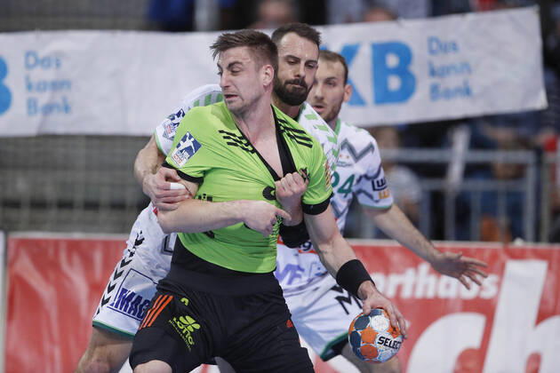 08 03 2020, TUI Arena, Hanover, League match, 1 Bundesliga, TSV Hanover Burgdorf vs Frisch Auf Goeppingen, in the picture Nejc Cehte 3, Han Burgdorf in duel with Tim Kneule 4, Goeppingen TSV Hanover Burgdorf vs Frisch Auf Goeppingen