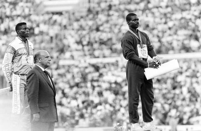 870830 Athletics, World Athletics Championships Winner Ben Johnson, Canada, and 2nd placed Carl Lewis, USA, react on the podium after the 100 m final at The World Athletics Championships on August 30, 1987 in Rome, Italy BILDBYRAN,  Copyright: BILDBYRAN 870830019