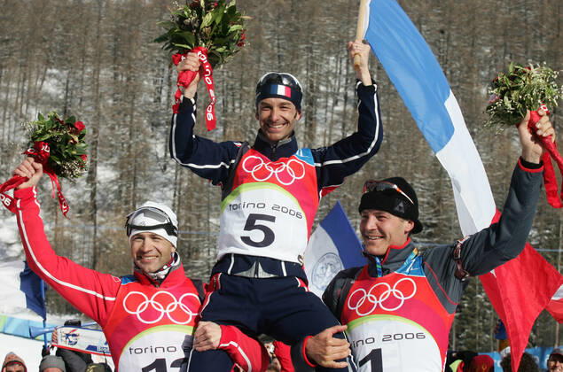 060218 Winter Olympics 2006, Biathlon Gold medalist Vincent Defrasne of France is flanked by silver medalist Ole Einar Bjorndalen of Norway and bronze medalist Sven Fischer of Germany after 12,5 km pursuit at The Winter Olympic Games on February 18, 2006 in Turin, Italy BILDBYRAN,  Copyright: ArnexForsell BB060218AF063