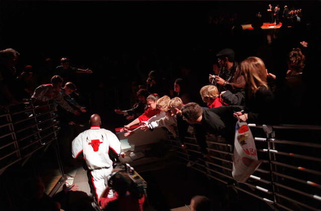 May 18, 2020, Chicago, IL, USA: In this file photo, with fans reaching for a touch, Michael Jordan steps into the spotlight as he s introduced for the Bulls 5th NBA, Basketball Herren, USA Championships ring ceremony on Nov. 1, 1997, at the United Center. ESPN recently relased a 10-part-series, The Last Dance, on Michael Jordan and Chicago Bulls. Chicago USA - ZUMAm67_ 20200518_zaf_m67_013 Copyright: xJohnxLee ChicagoxTribunex