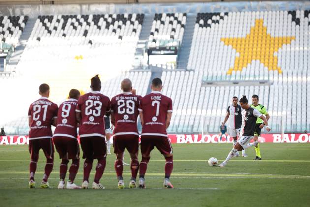 Juventus s Portuguese striker Cristiano Ronaldo scores from a second half free kick to give the side a 3-1 lead during the Serie A match at Allianz Stadium, Turin. Picture date: 4th July 2020. Picture credit should read: Jonathan Moscrop Sportimage EDITORIAL USE ONLY. No use with unauthorised audio, video, data, fixture lists, club league logos or live services. Online in-match use limited to 120 images, no video emulation. No use in betting, games or single club league player publications. SPI-0579-0012