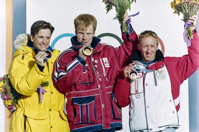 980222 Winter Olympics 1998, Cross Country Skiing: Gold medalist Bjorn Daehlie of Norway is flanked by silver medalist Niklas Jonsson of Sweden (L) and bronze medalist Christian Hoffmann of Austria after 50 km freestyle at The Winter Olympic Games, Olympische Spiele, Olympia, OS on February 22, 1998 in Nagano, Japan. BILDBYRAN  Copyright: BILDBYRAN BB980222BB053