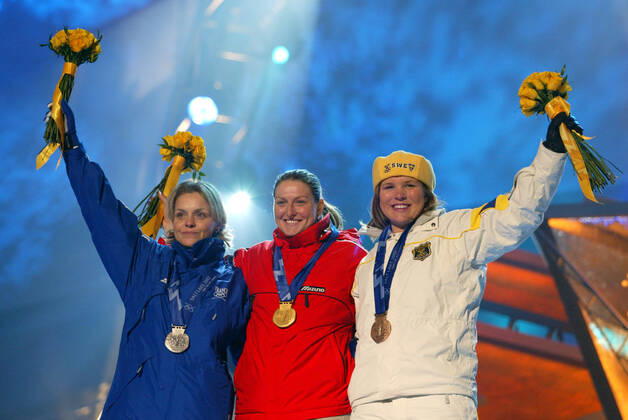 020220 Winter Olympics 2002, Alpine Skiing: Gold medalist Janica Kostelic of Croatia is flanked by silver medalist Laure Pequegnot of France (L) and bronze medalist Anja Parson of Sweden during prize ceremony for womens slalom at The Winter Olympic Games, Olympische Spiele, Olympia, OS on February 20, 2002 in Salt Lake City, USA. BILDBYRAN  Copyright: NIKLASxLARSSON BB020220NL021
