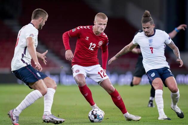 Denmarks Kasper Dolberg between Englands Kalvin Phillips and Eric Dier during the Nations League match between Denmark and England in the Park, Tuesday 8 September 2020, Copenhagen Denmark,  Copyright: Ritzau Scanpix LiselottexSabroex COP101 spdk20200908-214309-L