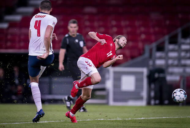 Denmarks Rasmus Falk and Englands Conor Coady during the Nations League match between Denmark and England in the Park, Tuesday 8 September 2020, Copenhagen Denmark,  Copyright: Ritzau Scanpix LiselottexSabroex COP101 spdk20200908-235124-L