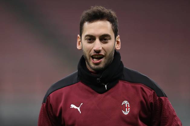 Hakan Calhanoglu of AC Milan during the warm up prior to the Coppa Italia match at Giuseppe Meazza, Milan. Picture date: 12th January 2021. Picture credit should read: Jonathan Moscrop Sportimage EDITORIAL USE ONLY. No use with unauthorised audio, video, data, fixture lists, club league logos or live services. Online in-match use limited to 120 images, no video emulation. No use in betting, games or single club league player publications. SPI-0842-0072