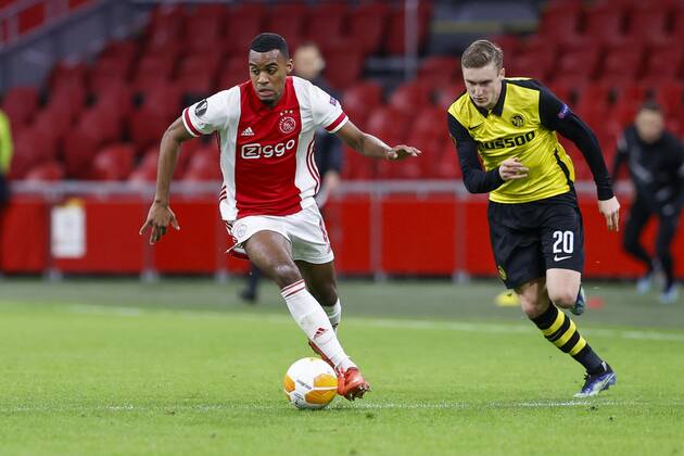 AMSTERDAM , 11-03-2021 , Johan Cruijff Arena , Dutch football , Europa League , round of sixteen first leg , season 2020 2021. (L-R) Ajax player Ryan Gravenberch and Young Boys player Michel Aebischer during the match Ajax vs Young Boys Ajax - Young Boys  x11072390x Copyright: