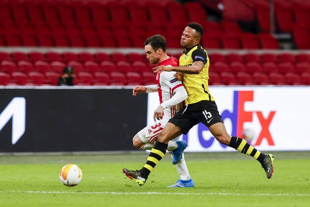 AMSTERDAM , 11-03-2021 , Johan Cruijff Arena , Dutch football , Europa League , round of sixteen first leg , season 2020 2021. (L-R) Ajax player Nico Tagliafico and Young Boys player Meschack Elia during the match Ajax vs Young Boys Ajax - Young Boys  x11072503x Copyright: