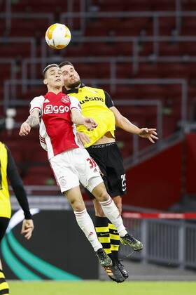 AMSTERDAM , 11}-03-2021 , Johan Cruijff Arena , Dutch football , Europa League , round of sixteen first leg , season 2020 2021. (L-R)Ajax player Antony and Young Boys player Jordan Lefort during the match Ajax vs Young Boys Ajax - Young Boys  x11074714x Copyright: