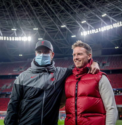 Liverpool coach Juergen Klopp and Leipzig coach Julian Nagelsmann stand together and talk UEFA Champions League Round of 16, second leg FC Liverpool RB Leipzig 2 0 10 03 2021, Puskas Arena in Budapest Hungary FC Liverpool RB Leipzig