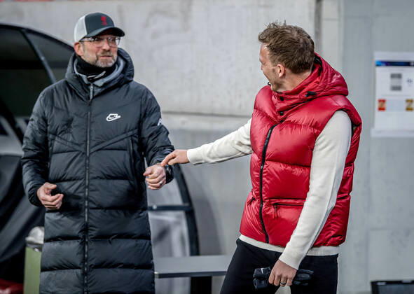 Liverpool coach Juergen Klopp and Leipzig coach Julian Nagelsmann stand together and talk UEFA Champions League Round of 16, second leg FC Liverpool RB Leipzig 2 0 10 03 2021, Puskas Arena in Budapest Hungary FC Liverpool RB Leipzig