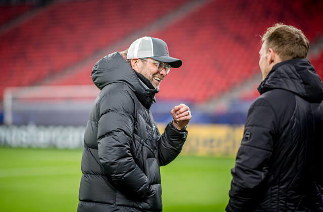 Liverpool coach Juergen Klopp and Leipzig coach Julian Nagelsmann stand together and talk UEFA Champions League Round of 16, second leg FC Liverpool RB Leipzig 2 0 10 03 2021, Puskas Arena in Budapest Hungary FC Liverpool RB Leipzig