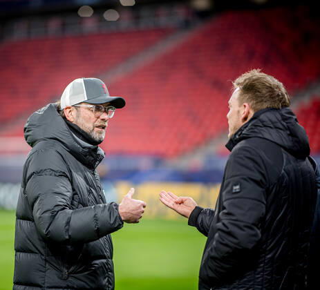 Liverpool coach Juergen Klopp and Leipzig coach Julian Nagelsmann stand together and talk UEFA Champions League Round of 16, second leg FC Liverpool RB Leipzig 2 0 10 03 2021, Puskas Arena in Budapest Hungary FC Liverpool RB Leipzig