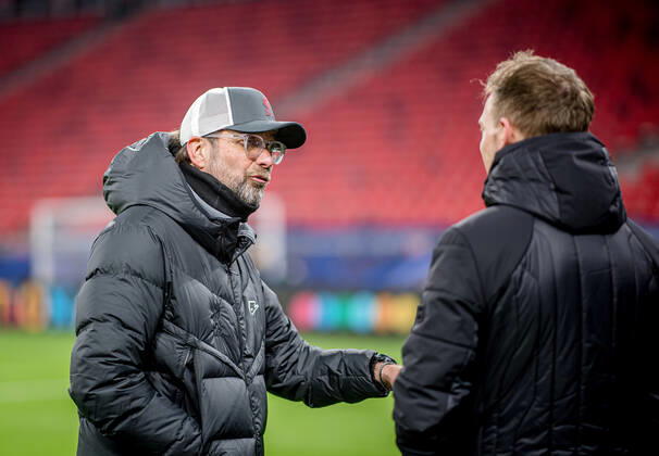 Liverpool coach Juergen Klopp and Leipzig coach Julian Nagelsmann stand together and talk UEFA Champions League Round of 16, second leg FC Liverpool RB Leipzig 2 0 10 03 2021, Puskas Arena in Budapest Hungary FC Liverpool RB Leipzig