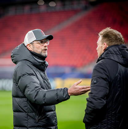 Liverpool coach Juergen Klopp and Leipzig coach Julian Nagelsmann stand together and talk UEFA Champions League Round of 16, second leg FC Liverpool RB Leipzig 2 0 10 03 2021, Puskas Arena in Budapest Hungary FC Liverpool RB Leipzig