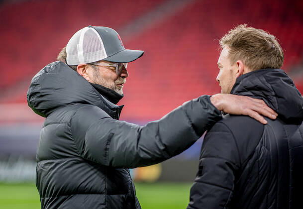 Liverpool coach Juergen Klopp and Leipzig coach Julian Nagelsmann stand together and talk UEFA Champions League Round of 16, second leg FC Liverpool RB Leipzig 2 0 10 03 2021, Puskas Arena in Budapest Hungary FC Liverpool RB Leipzig