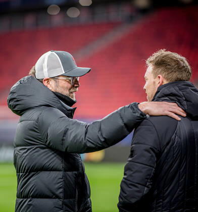 Liverpool coach Juergen Klopp and Leipzig coach Julian Nagelsmann stand together and talk UEFA Champions League Round of 16, second leg FC Liverpool RB Leipzig 2 0 10 03 2021, Puskas Arena in Budapest Hungary FC Liverpool RB Leipzig