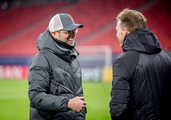 Liverpool coach Juergen Klopp and Leipzig coach Julian Nagelsmann stand together and talk UEFA Champions League Round of 16, second leg FC Liverpool RB Leipzig 2 0 10 03 2021, Puskas Arena in Budapest Hungary FC Liverpool RB Leipzig
