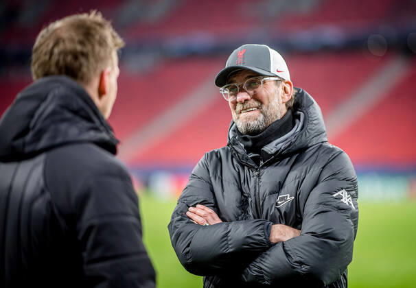 Liverpool coach Juergen Klopp and Leipzig coach Julian Nagelsmann stand together and talk UEFA Champions League Round of 16, second leg FC Liverpool RB Leipzig 2 0 10 03 2021, Puskas Arena in Budapest Hungary FC Liverpool RB Leipzig