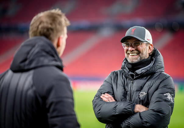 Liverpool coach Juergen Klopp and Leipzig coach Julian Nagelsmann stand together and talk UEFA Champions League Round of 16, second leg FC Liverpool RB Leipzig 2 0 10 03 2021, Puskas Arena in Budapest Hungary FC Liverpool RB Leipzig