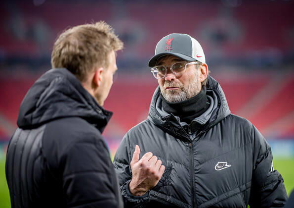 Liverpool coach Juergen Klopp and Leipzig coach Julian Nagelsmann stand together and talk UEFA Champions League Round of 16, second leg FC Liverpool RB Leipzig 2 0 10 03 2021, Puskas Arena in Budapest Hungary FC Liverpool RB Leipzig